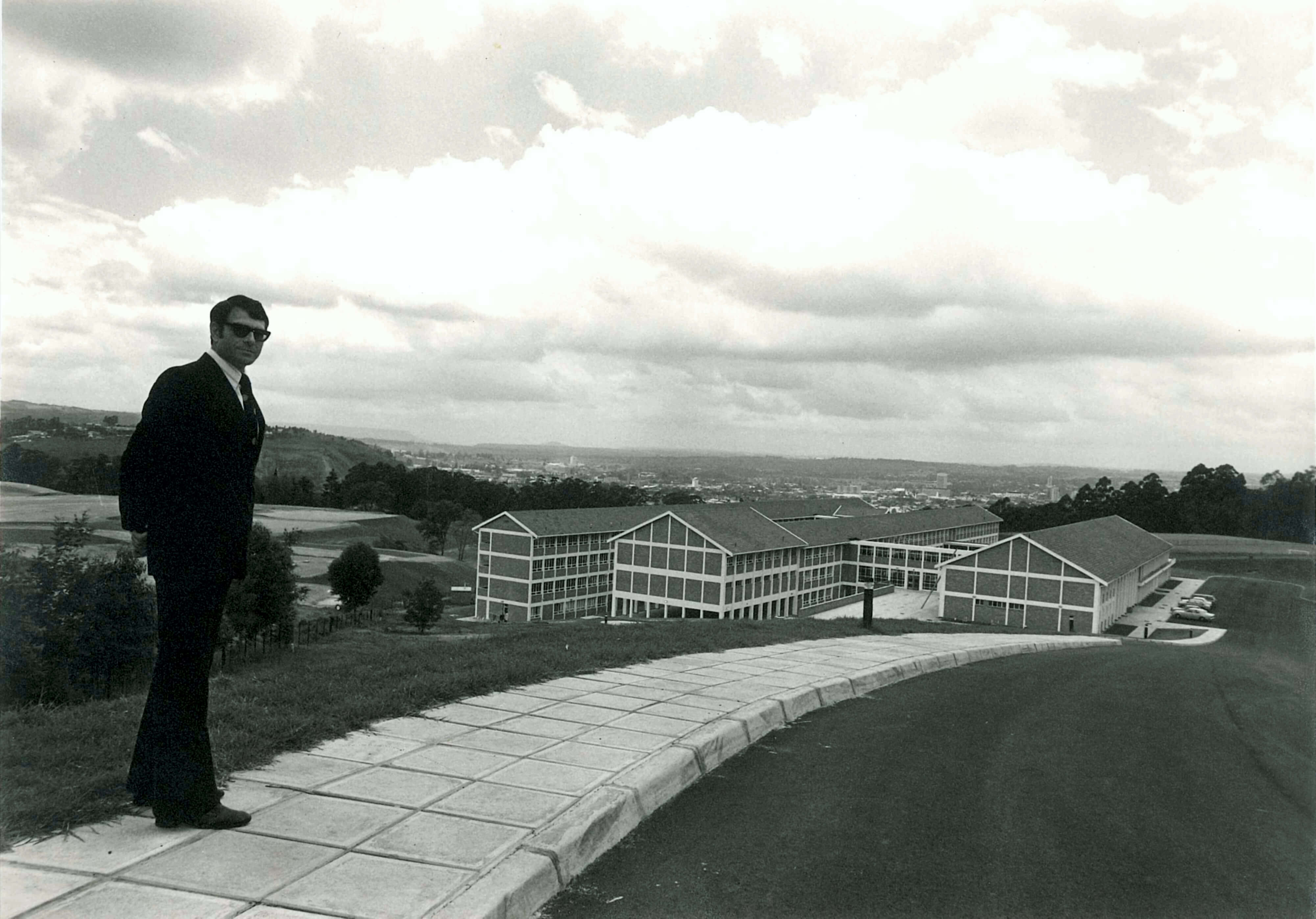 Dr Schroenn at the top of the school photo